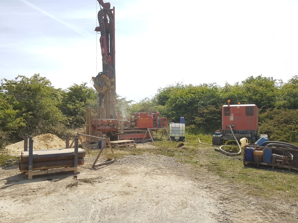 Drilling rig creating boreholes used for water wells | Drilcorp